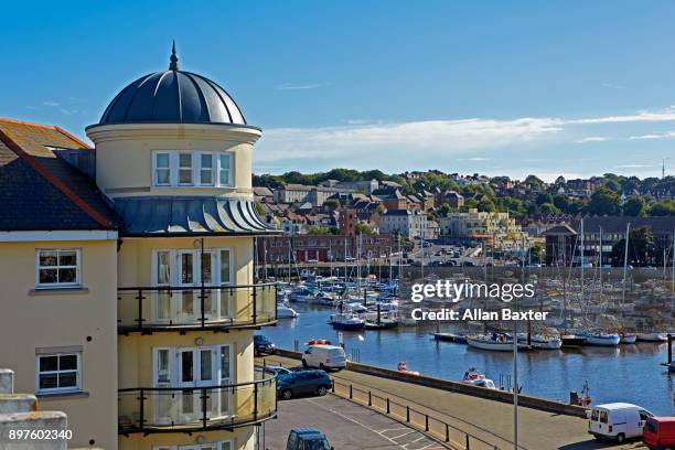 view over weymouth harbour with blue skies - weymouth stock pictures, royalty-free photos & images