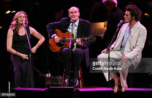 Sally Taylor, James Taylor and Ben Taylor perform onstage during the 2008 Rainforest Foundation Fund Benefit Concert at Carnegie Hall on May 8, 2008...