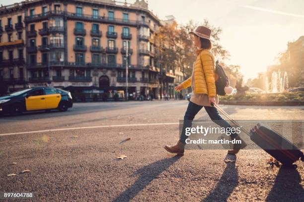 tourist visiting barcelona - leaving city stock pictures, royalty-free photos & images