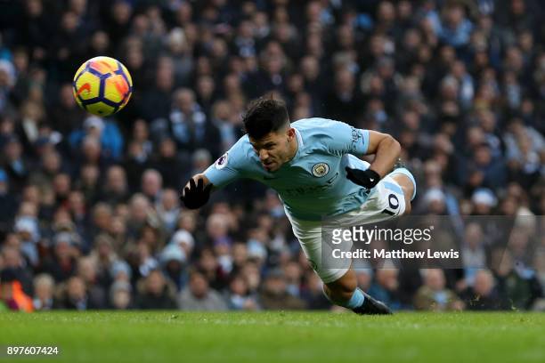 Sergio Aguero of Manchester City scores his sides first goal during the Premier League match between Manchester City and AFC Bournemouth at Etihad...