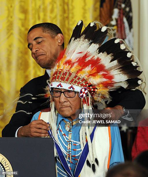 President Barack Obama awards Joseph Medicine Crow � High Bird the Presidential Medal of Freedom during a ceremony in the East Room at the White...