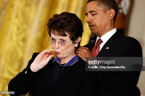 President Barack Obama presents the Medal of Freedom to tennis champion Billie Jean King during a ceremony in the East Room of the White House August...