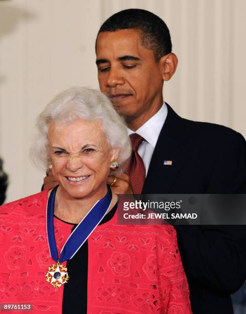 President Barack Obama presents the Presidential Medal of Freedom to former US Supreme Court Justice Sandra Day O�Connor during a ceremony in the...