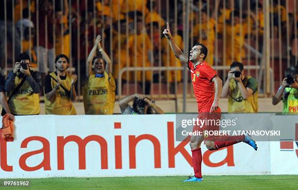 Macedonia's Goran Pandev celebrates after scoring against Spain during an international friendly football match in Skopje on August 12, 2009. AFP...