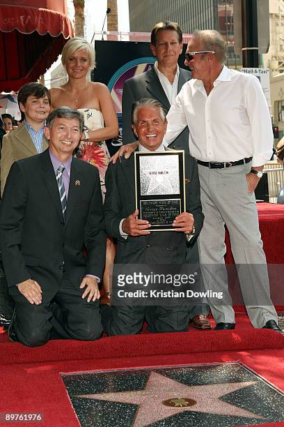George Hamilton with partner Barbara Sturm, son GT Hamilton and actor/friend James Caan is honored on the Hollywood Walk Of Fame on August 12, 2009...