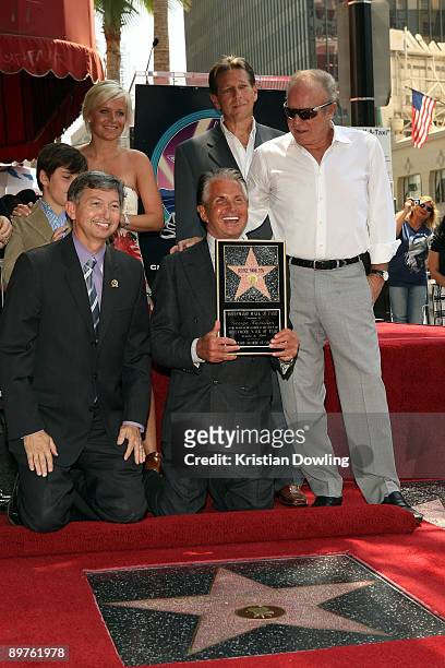 George Hamilton with partner Barbara Sturm, son GT Hamilton and actor/friend James Caan is honored on the Hollywood Walk Of Fame on August 12, 2009...
