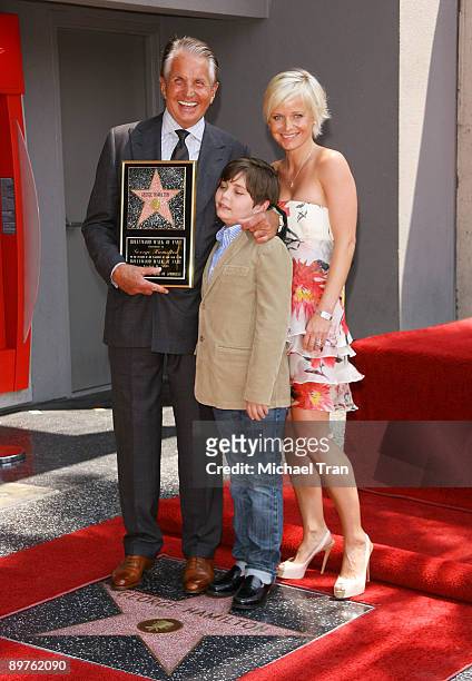 Actor George Hamilton with girlfriend, Barbara Sturm and his son, George Thomas Hamilton attend the ceremony honoring the actor with a star on the...