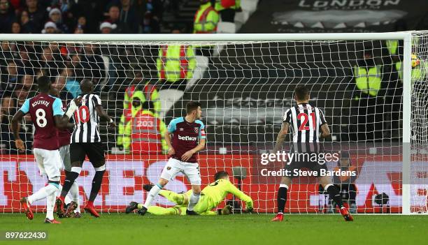 Mohamed Diame of Newcastle United scores his sides second goal during the Premier League match between West Ham United and Newcastle United at London...