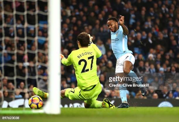 Raheem Sterling of Manchester City celebrates after scoring his sides second goal past Asmir Begovic of AFC Bournemouth during the Premier League...