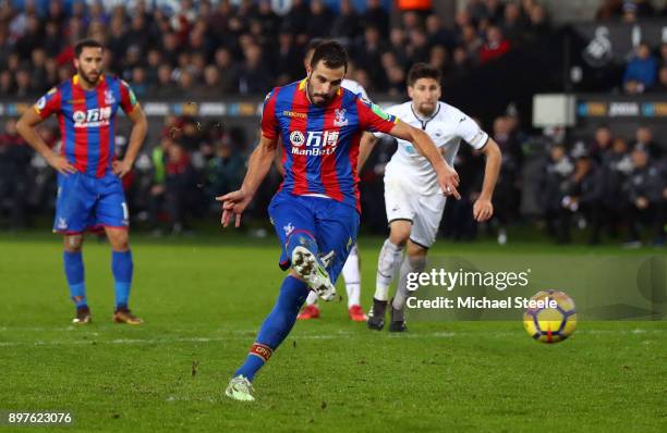 Luka Milivojevic of Crystal Palace scores his sides first goal from the penalty spot during the Premier League match between Swansea City and Crystal...