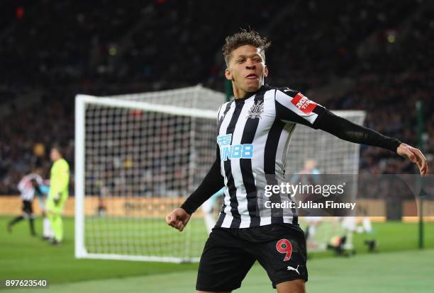 Dwight Gayle of Newcastle United celebrates after Christian Atsu scores his sides third goal during the Premier League match between West Ham United...