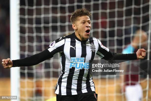 Dwight Gayle of Newcastle United celebrates after Christian Atsu scores his sides third goal during the Premier League match between West Ham United...