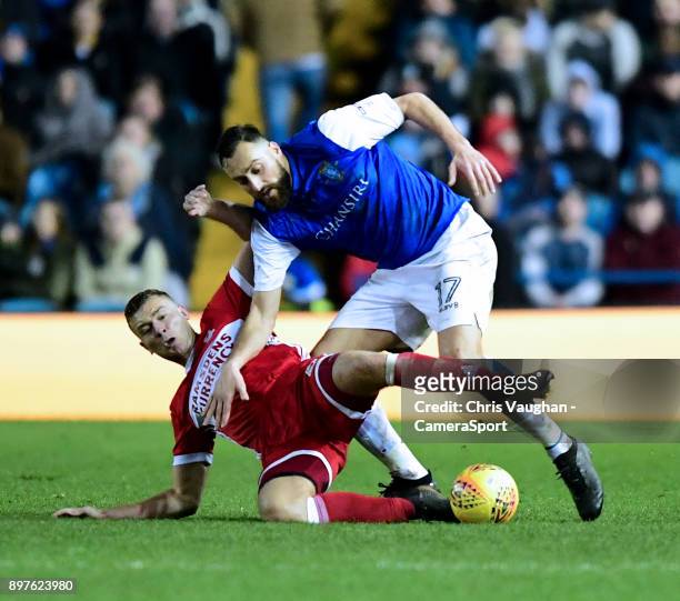 Sheffield Wednesday's Atdhe Nuhiu is tackled by Middlesbrough's Ben Gibson during the Sky Bet Championship match between Sheffield Wednesday and...