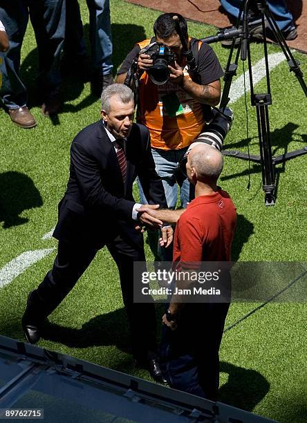 Mexico's head coach Javier Aguirre and United States coach Bob Bradley shake hands during their 2010 FIFA World Cup qualifying soccer match at the...