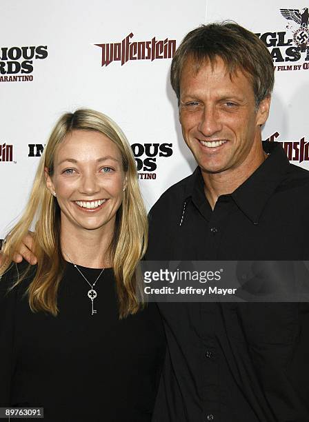 Skater Tony Hawk and wife Lhotse Merriam arrive at the Los Angeles premiere of "Inglourious Basterds" at the Grauman's Chinese Theatre on August 10,...