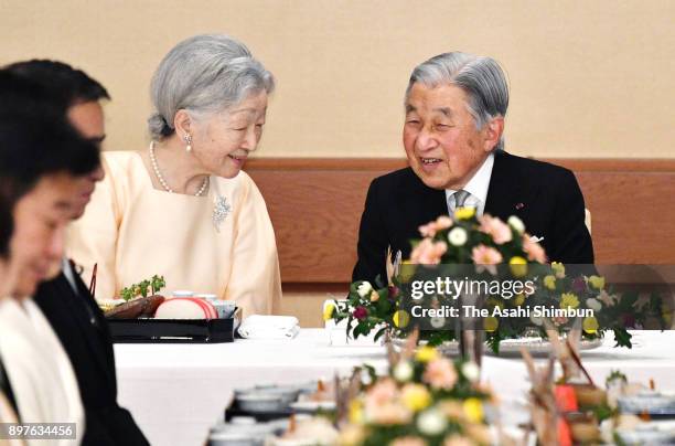 Emperor Akihito talks with Empress Michiko during a banquet celebrating his 84th birthday at the Imperial Palace on December 23, 2017 in Tokyo, Japan.