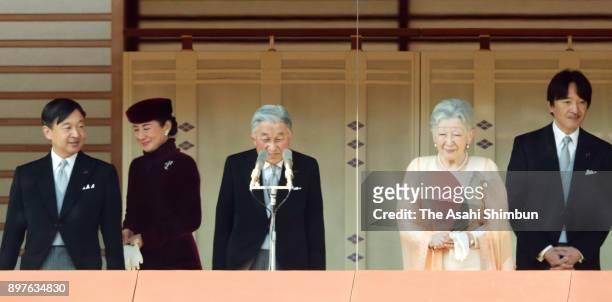 Emperor Akihito arrives at the balcony with Empress Michiko, Crown Prince Naruhito, Crown Princess Masako and Prince Akishino to greet well-wishers...