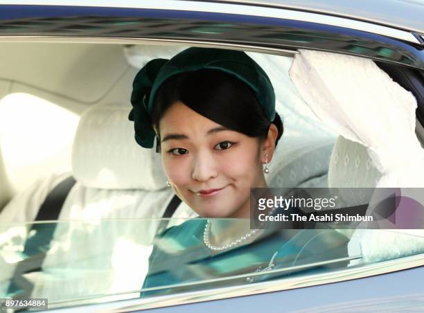 Princess Mako of Akishino is seen on arrival to attend a greeting session at the Imperial Palace celebrating Emperor Akihito's 84th birthday on...