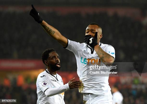 Jordan Ayew of Swansea City celebrates after scoring his sides first goal during the Premier League match between Swansea City and Crystal Palace at...