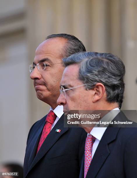 Colombia's President Alvaro Uribe meets his Mexican counterpart Felipe Calderon at the presidential residence Casa de Narino on August 12, 2009 in...