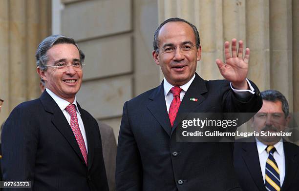 Colombia's President Alvaro Uribe meets his Mexican counterpart Felipe Calderon at the presidential residence Casa de Narino on August 12, 2009 in...