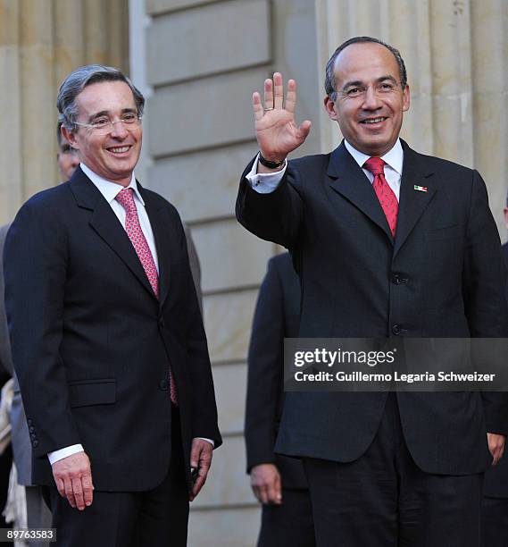 Colombia's President Alvaro Uribe meets his Mexican counterpart Felipe Calderon at the presidential residence Casa de Narino on August 12, 2009 in...