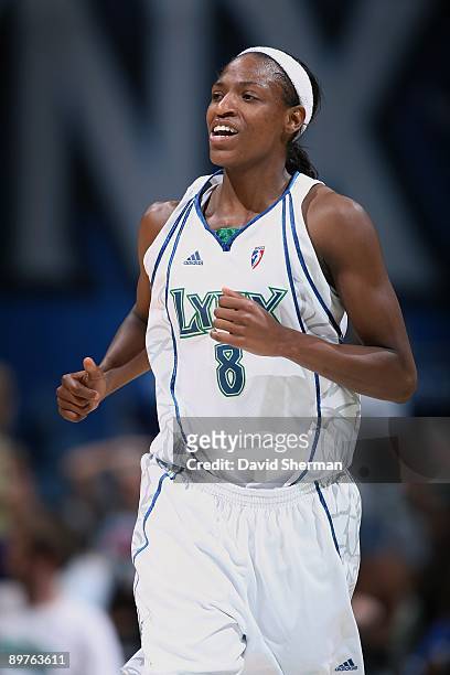 Rashanda McCants of the Minnesota Lynx runs down the court during the game against the San Antonio Silver Stars on August 9, 2009 at the Target...
