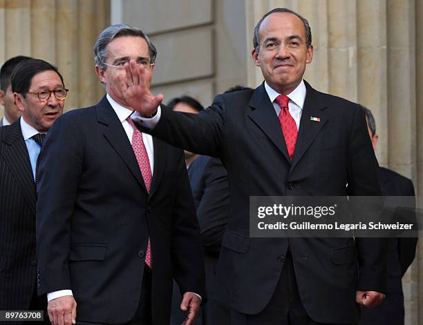 Colombia's President Alvaro Uribe meets his Mexican counterpart Felipe Calderon at the presidential residence Casa de Narino on August 12, 2009 in...