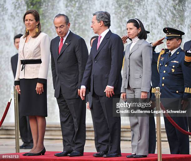 Colombia's President Alvaro Uribe and wife Lina Moreno meet Mexican leader Felipe Calderon and wife Margarita Zavala at the presidential residence...