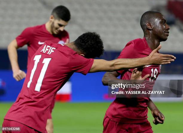 Qatar's forward Akram Afif celebrates after scoring a goal against Yemen during their 2017 Gulf Cup of Nations football match between Qatar and Yemen...