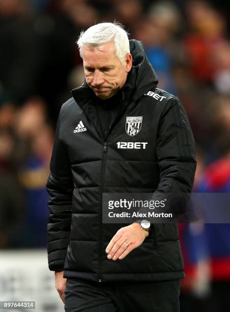 Alan Pardew, Manager of West Bromwich Albion look dejected after the Premier League match between Stoke City and West Bromwich Albion at Bet365...