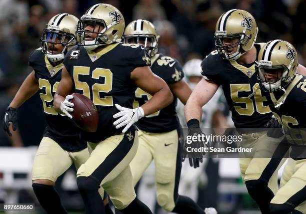 Craig Robertson of the New Orleans Saints reacts after intercepting a pass during a NFL game against the New York Jets at the Mercedes-Benz Superdome...
