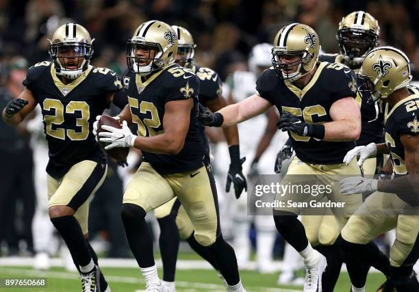 Craig Robertson of the New Orleans Saints reacts after intercepting a pass during a NFL game against the New York Jets at the Mercedes-Benz Superdome...