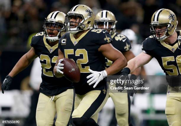 Craig Robertson of the New Orleans Saints reacts after intercepting a pass during a NFL game against the New York Jets at the Mercedes-Benz Superdome...