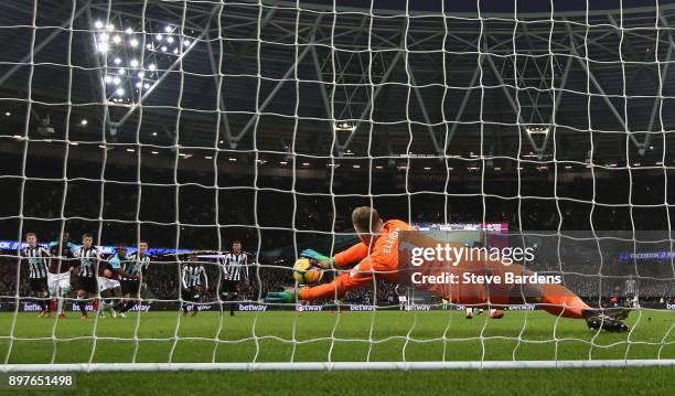 Robert Elliot of Newcastle United saves a penalty from Andre Ayew during the Premier League match between West Ham United and Newcastle United at...