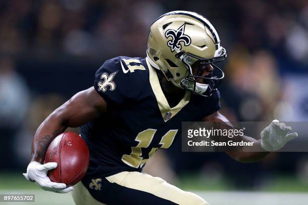 Tommylee Lewis of the New Orleans Saints runs the ball during a NFL game against the New York Jets at the Mercedes-Benz Superdome on December 17,...