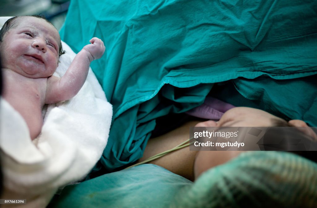 Newborn child seconds and minutes after birth.