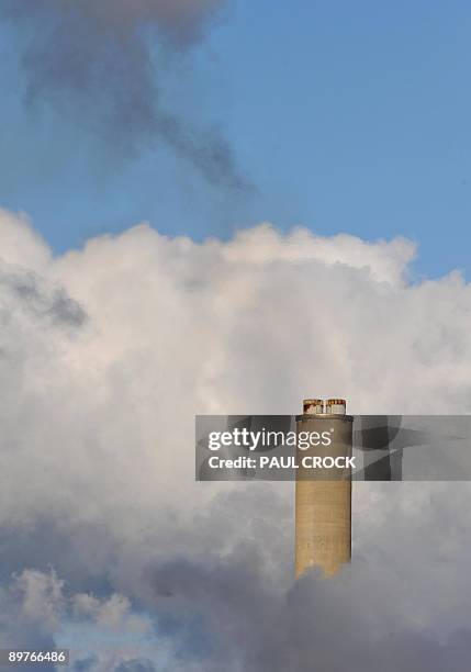Australia-Environment-Climate An exhaust stack rises through the steam of the Loy Yang B power station in the Latrobe Valley, 150km east of Melbourne...