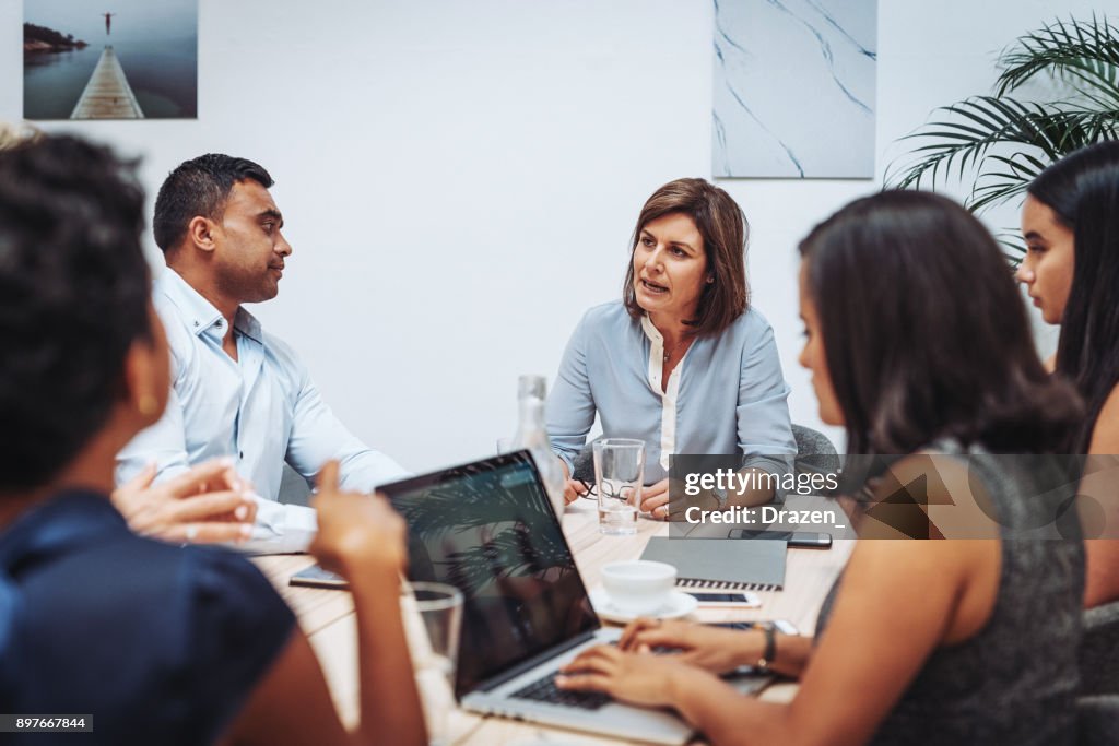 Decision makers and policy makers discussing new regulations in Australia