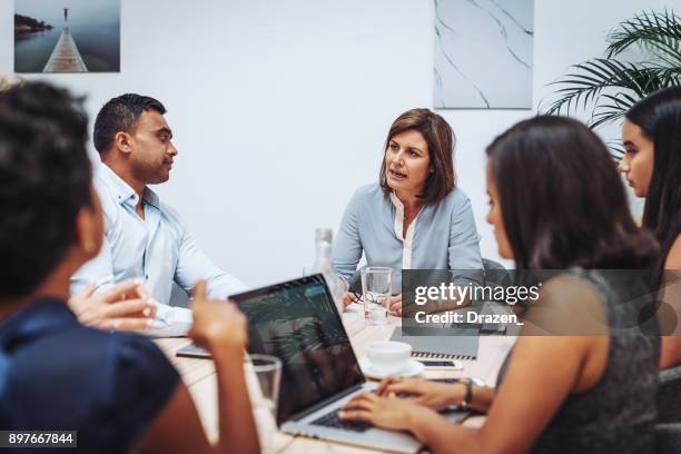 decision makers and policy makers discussing new regulations in australia - hierarquia de corporação imagens e fotografias de stock