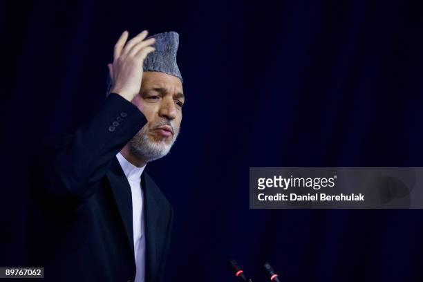 Afghan president Hamid Karzai speaks at an election campaign rally for women teachers on August 13, 2009 in Kabul, Afghanistan. The incumbent...