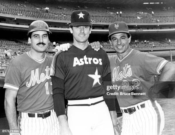 Keith Hernandez and Bobby Valentine of the New York Mets pose with Nolan Ryan of the Houston Astros before an MLB game circa 1984 at Shea Stadium in...