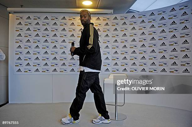 Sprinter Tyson Gay speaks with journalists during a press conference in Berlin, Germany on August 13 2 days before the opening of the 2009 IAAF...