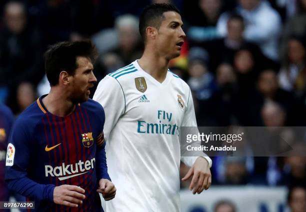 Cristiano Ronaldo of Real Madrid and Lionel Messi of Barcelona are seen during the La Liga match between Real Madrid and Barcelona at Santiago...