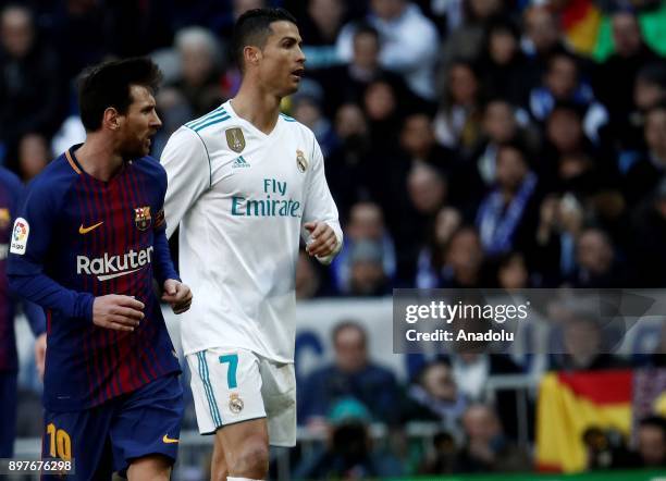 Cristiano Ronaldo of Real Madrid and Lionel Messi of Barcelona are seen during the La Liga match between Real Madrid and Barcelona at Santiago...