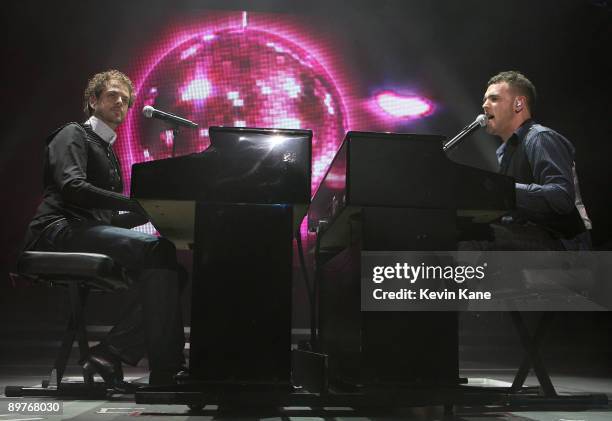 Scott Macintyre and Matt Girand perform during the 2009 American Idols Live concert at Nassau Veterans Memorial Coliseum on August 11, 2009 in...