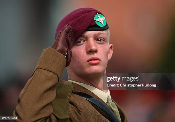 Junior Regimental Sergeant Major Aaron Marsh, a graduation prize winner, aged 17, of Telford takes the salute during Europe's biggest graduation...