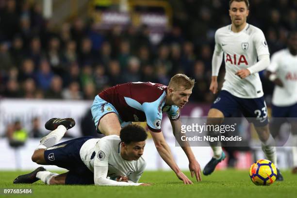 Dele Alli of Tottenham Hotspur and Ben Mee of Burnley in action during the Premier League match between Burnley and Tottenham Hotspur at Turf Moor on...