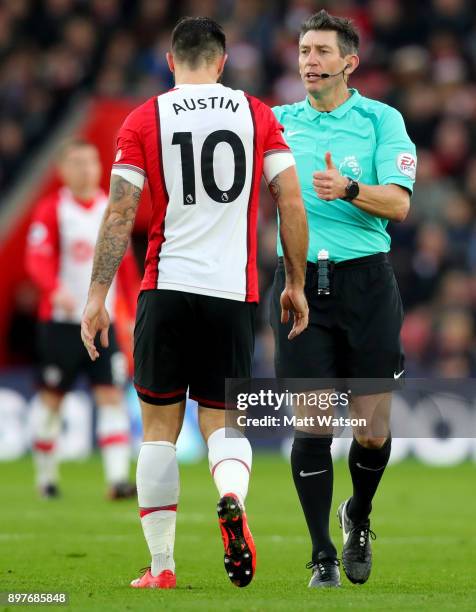Referee Lee Probert speaks to Charlie Austin of Southampton during the Premier League match between Southampton and Huddersfield Town at St Mary's...