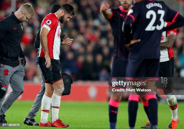 Southamptonâs Charlie Austin leaves the pitch injured during the Premier League match between Southampton and Huddersfield Town at St Mary's Stadium...